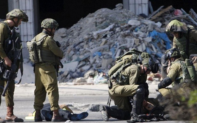 Palestinian shot dead after trying to stab Israeli soldiers - military